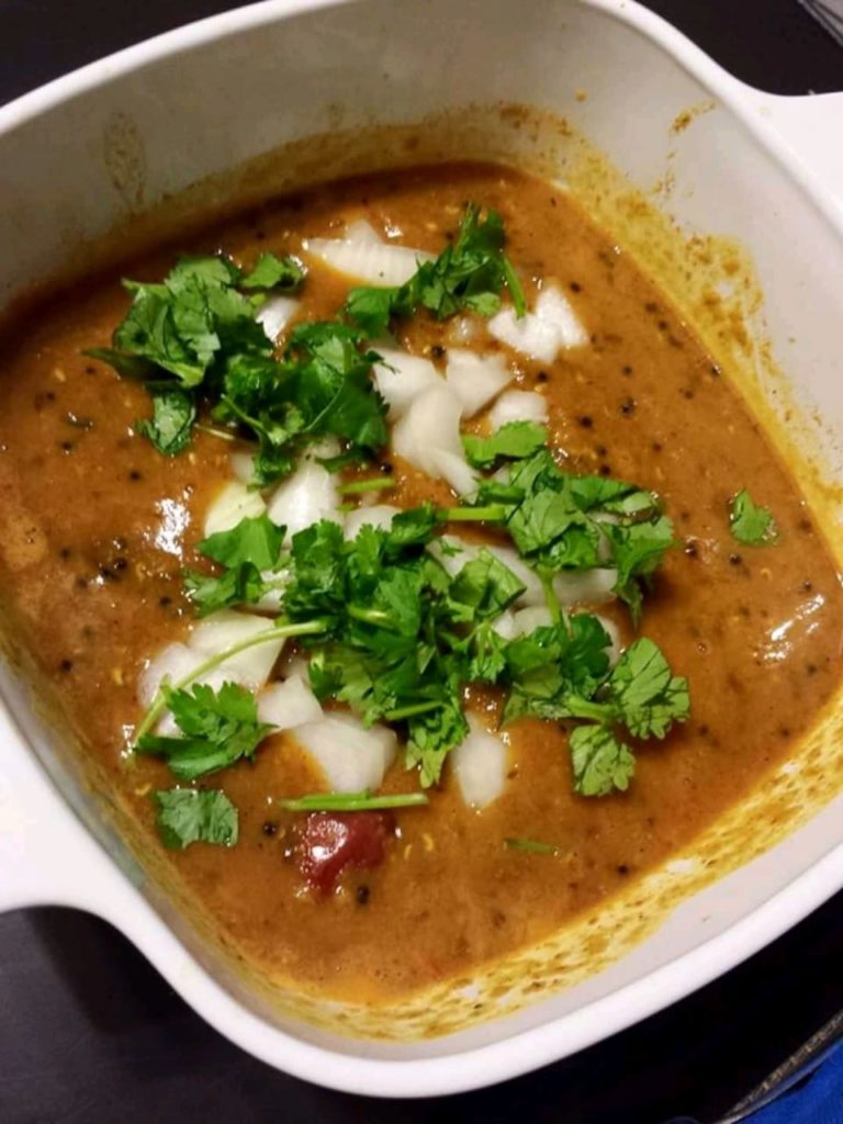 Dal Dhokli (  Boiled wheat flour dumplings in pulse gravy )
