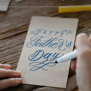 Happy family celebrating Father's Day together with gifts, smiles, and quality time at home