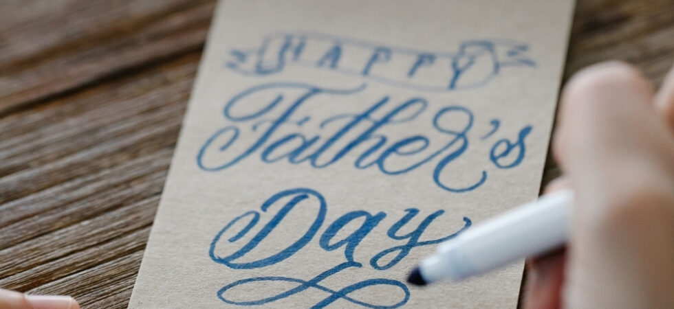Happy family celebrating Father's Day together with gifts, smiles, and quality time at home